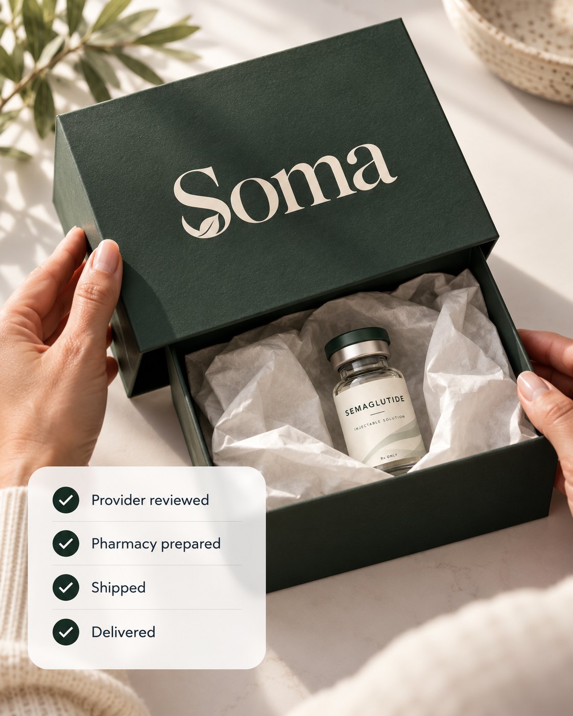 Hands opening a Soma box with a vial inside.