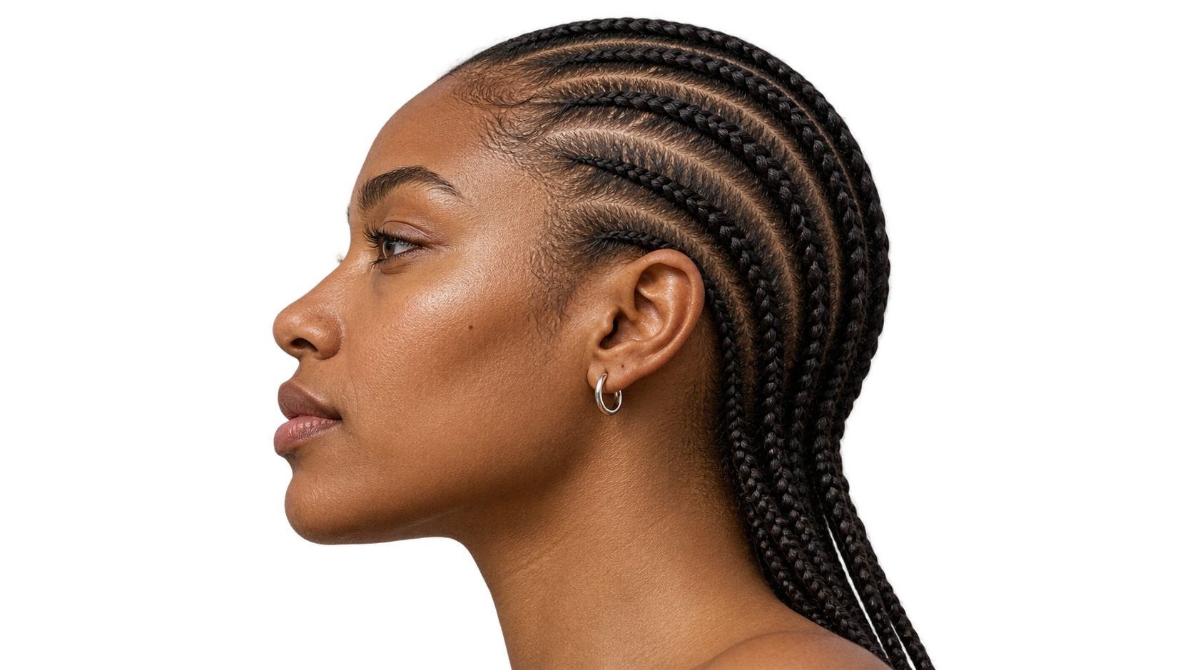 Profile portrait of a woman with long cornrow braids.