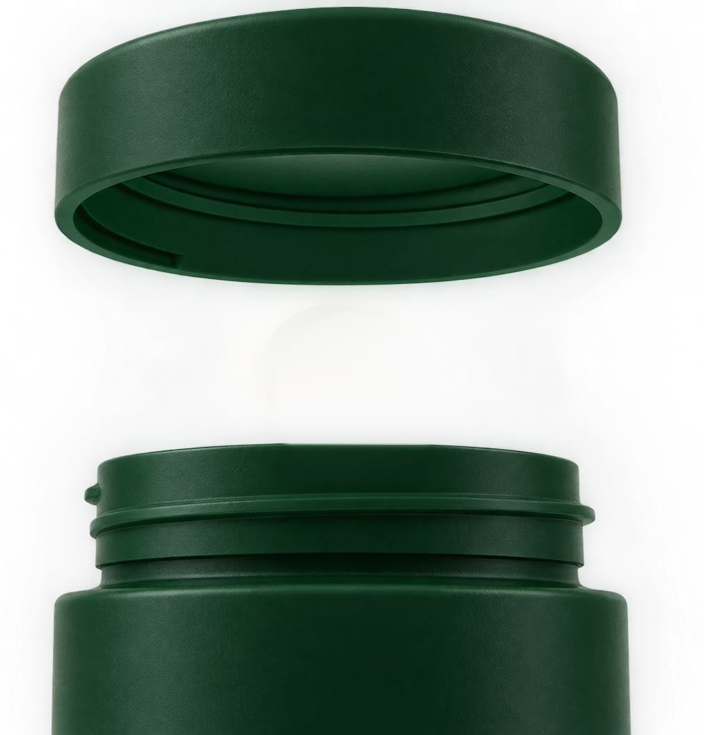 A dark green Soma pill bottle with its lid lifted and a single tablet floating above the opening.